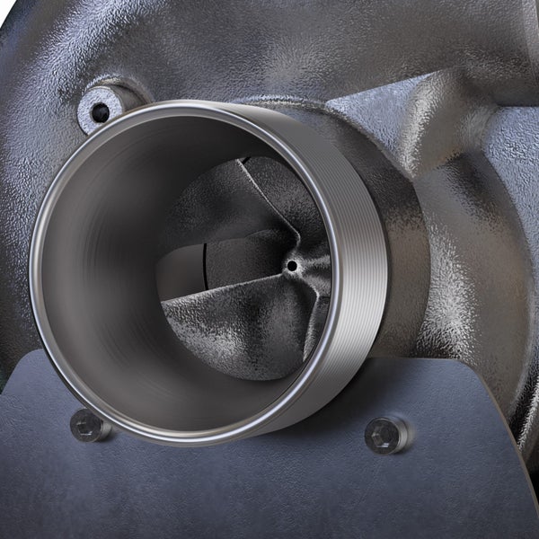 Nahaufnahme eines metallenen Pumpengehäuses mit sichtbarem Laufrad und Inbusschrauben.