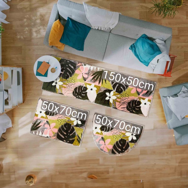 Drei Teppiche mit Blattmuster in verschiedenen Größen auf Holzboden