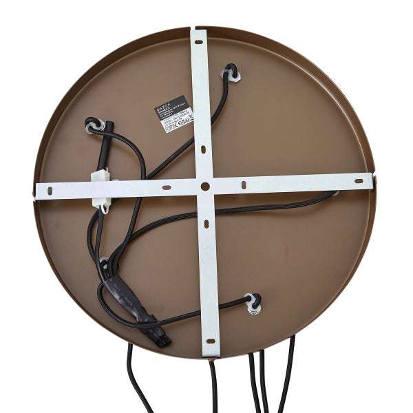 Rückseite einer braunen Lampe mit weißer Halterung und Kabeln