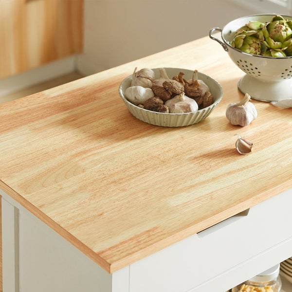 Küchenwagen mit Arbeitsplatte aus Holz, Knoblauch und Artischocken