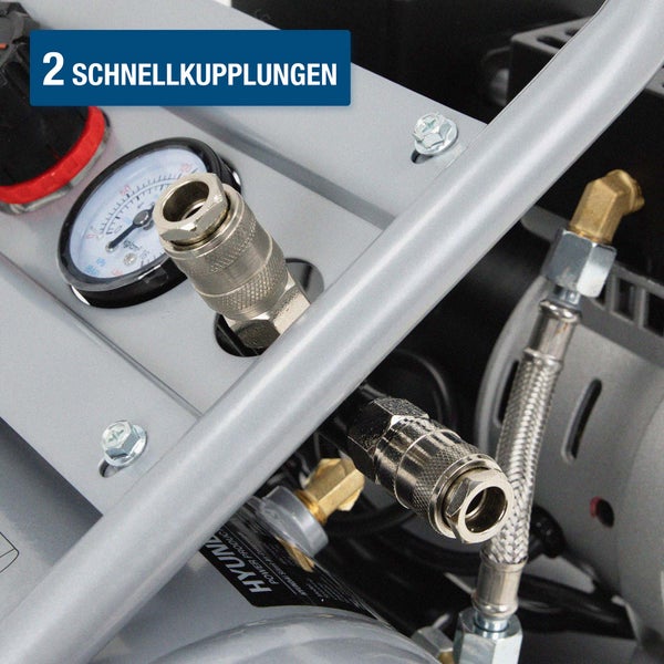 Detailansicht eines Kompressors mit zwei Schnellkupplungen und einem Manometer zur Druckanzeige.