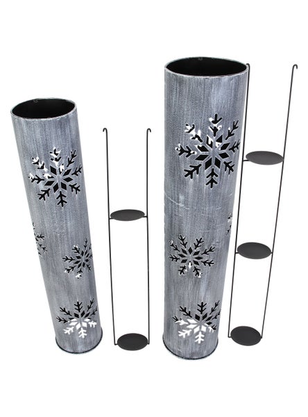 Zwei Windlichter mit Schneeflockenmuster und Teelichthalter