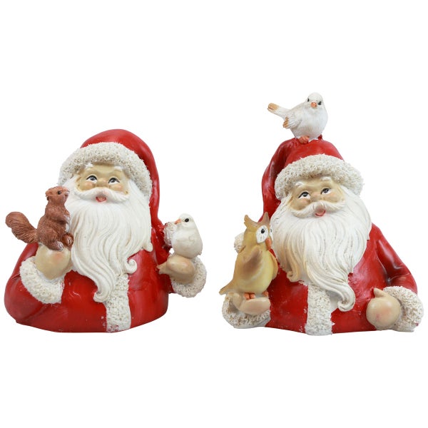 Zwei Weihnachtsmannfiguren mit Tieren als Dekoration
