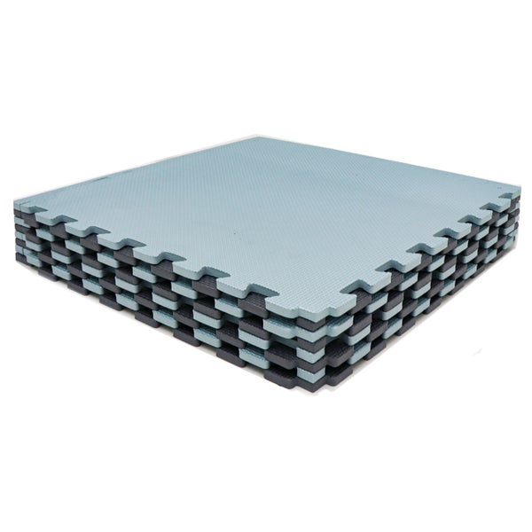 Stapelbare Bodenschutzmatten aus Schaumstoff mit Puzzle-Verzahnung.