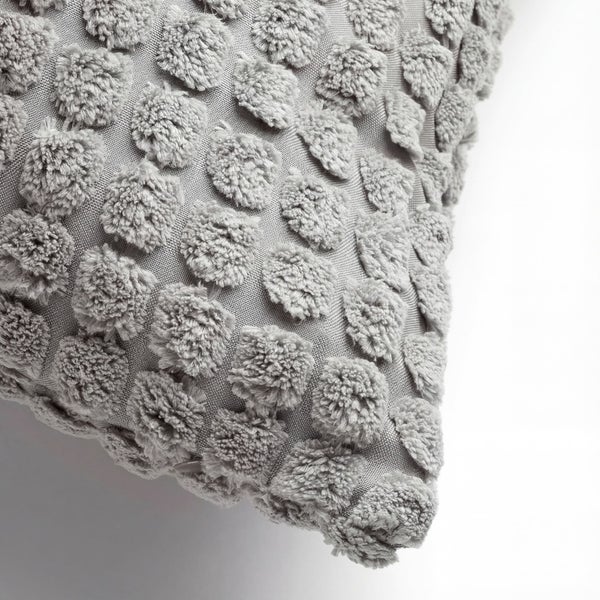 Dekokissen mit Noppenstruktur