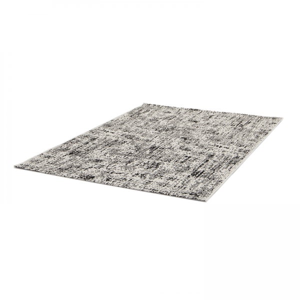 Rechteckiger Teppich mit abstraktem schwarz-weißem Muster in Vintage-Optik