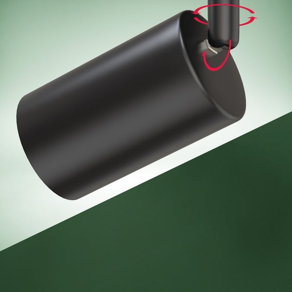 Zylindrischer schwarzer Strahler, drehbar und schwenkbar. Modernes Design für Wand oder Decke.