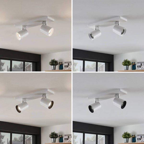 Deckenleuchte mit zwei Strahlern in verschiedenen Lichtstimmungen.