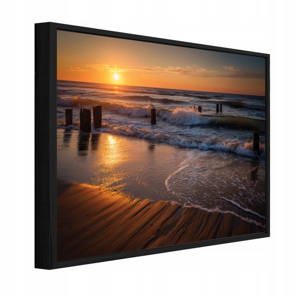 Wandbild mit Sonnenuntergang am Strand, eingerahmt in einem schwarzen Schattenfugenrahmen, Ansicht von der Seite.