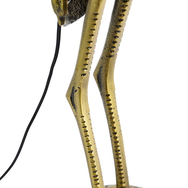 Detailaufnahme einer Dekorationsfigur aus Metall