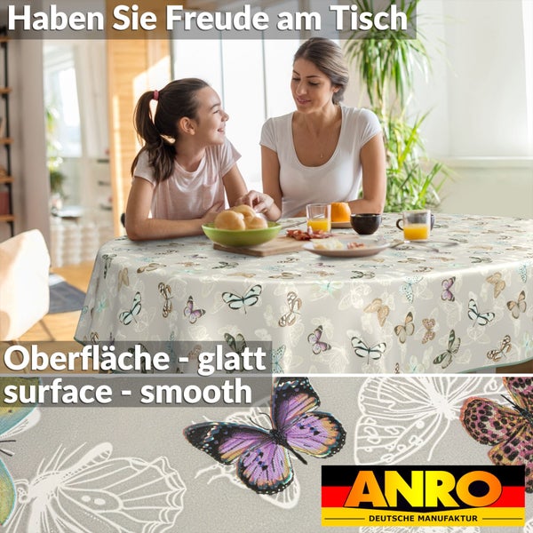 Esstisch mit Tischdecke mit Schmetterlingsmuster und ANRO Logo