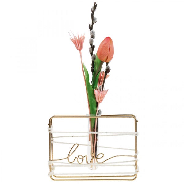 Dekorative Blumenvase mit der Aufschrift Liebe und verschiedenen Kunstblumen