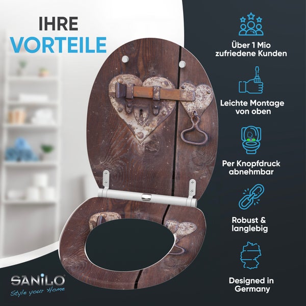 SANILO Logo, Toilettensitz mit Holzdekor und Herz-Motiv. Merkmale: Montage von oben, abnehmbar per Knopfdruck, robust, in Deutschland entworfen.