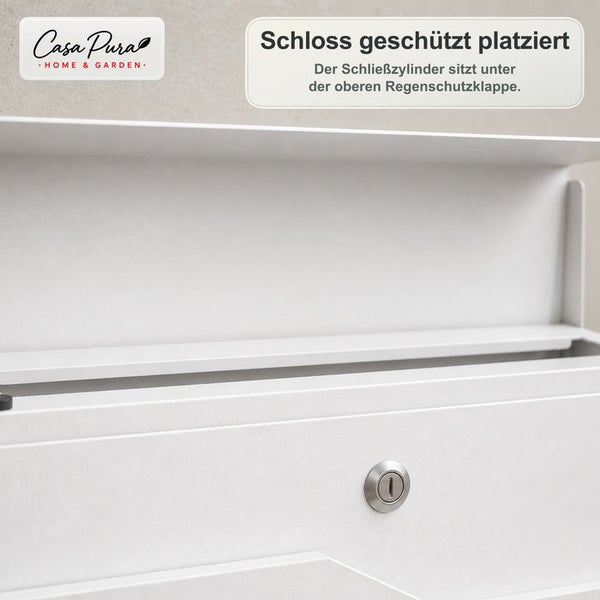 Briefkasten mit Regenschutzklappe und geschütztem Schließzylinder, Casa Pura Logo, detaillierte Ansicht des Briefschlitzes und Schlosses.