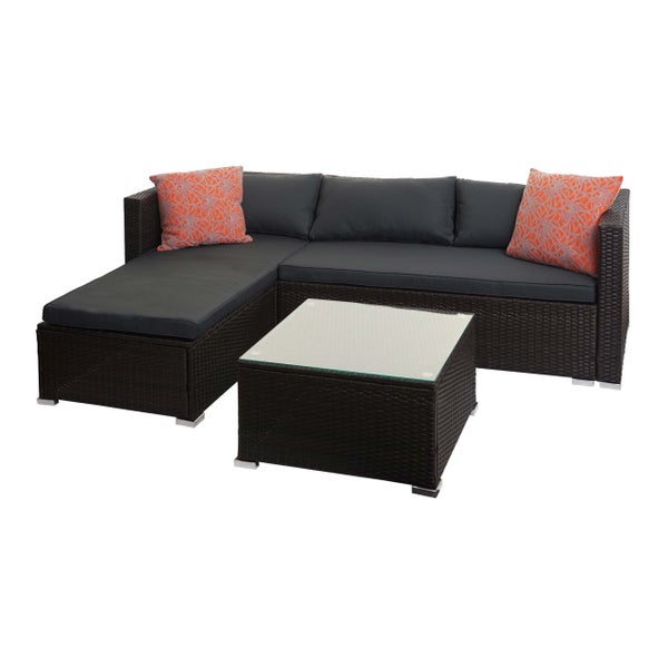 Polyrattan-Garten-Lounge-Set bestehend aus einem Ecksofa mit grauen Polstern und einem quadratischen Couchtisch mit Glasplatte.