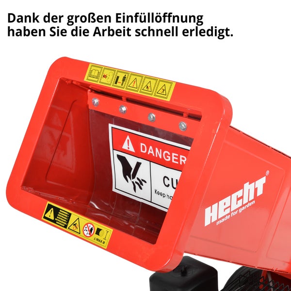 Einfülltrichter einer Gartenhäckslers mit Warnhinweisen