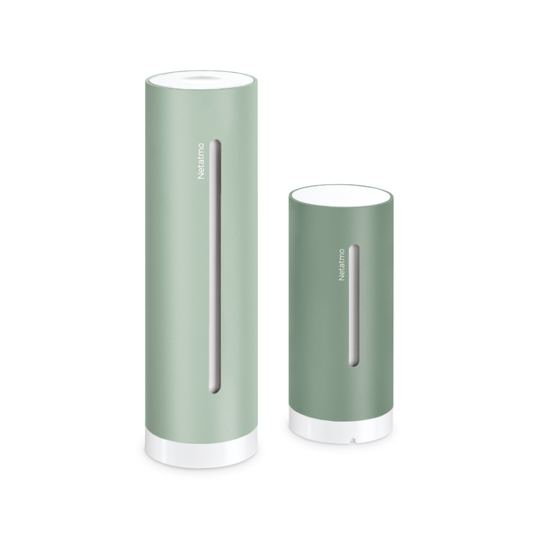 Netatmo Smarte Wetterstation mit einem Innen- und einem Außenmodul in grünem, zylindrischem Design.