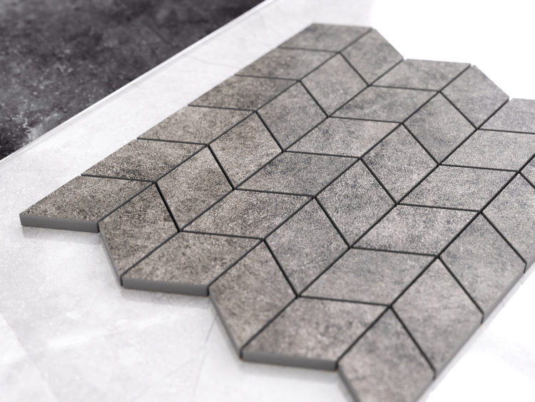 Mosaikfliese aus Feinsteinzeug in Rautenform mit Natursteinoptik.