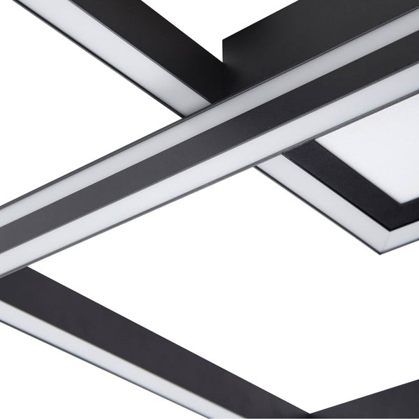 Detailansicht einer modernen LED-Deckenleuchte mit schwarzen rechteckigen Metallrahmen und weißen Lichtdiffusoren.