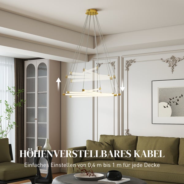 Modernes Esszimmer mit rundem Holztisch, Polstersesseln und einer Pendelleuchte mit sich kreuzenden Stäben vor einem großen Fenster.