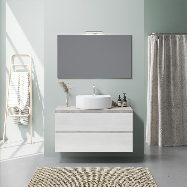 Modernes Badezimmer-Set bestehend aus wandhängendem Unterschrank mit zwei Schubladen, rundem Aufsatzwaschbecken und großem Spiegel mit LED-Leuchte.