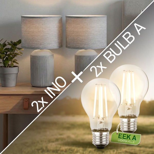 Set aus zwei Tischleuchten Ino mit Keramikfuß und Textilschirm inklusive zwei LED Filament Leuchtmitteln E27 der Energieeffizienzklasse A.