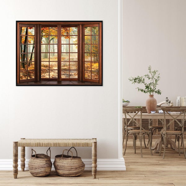 Wandbild mit Fensterrahmenmotiv und herbstlichem Waldweg in einem Wohnraum mit Holzkreuzstühlen, Holztisch und geflochtenen Körben auf einer Bank.