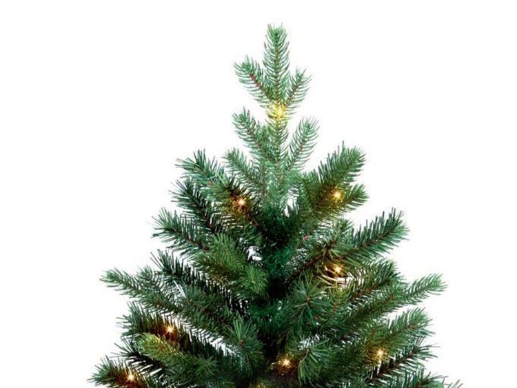 Kunstweihnachtsbaum mit integrierter LED Beleuchtung, Detailansicht der Spitze eines Tannenbaums