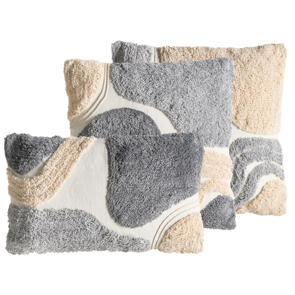 Drei dekorative Kissen mit abstraktem Muster