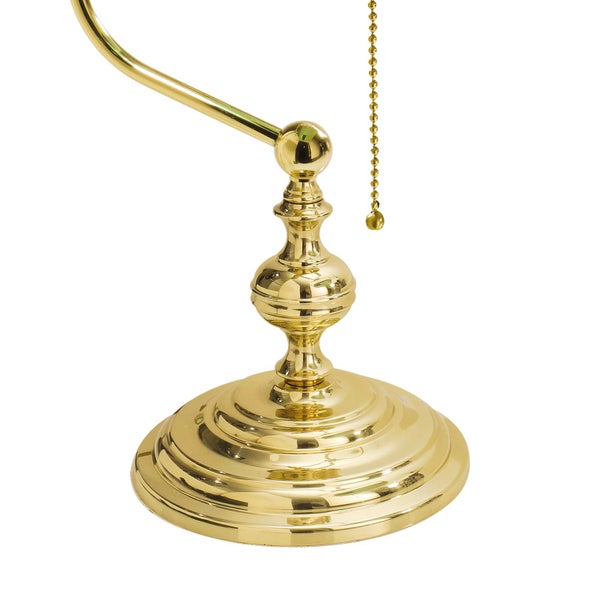 Detailansicht einer Tischleuchte mit Zugschalter und dekorativem Lampenfuß