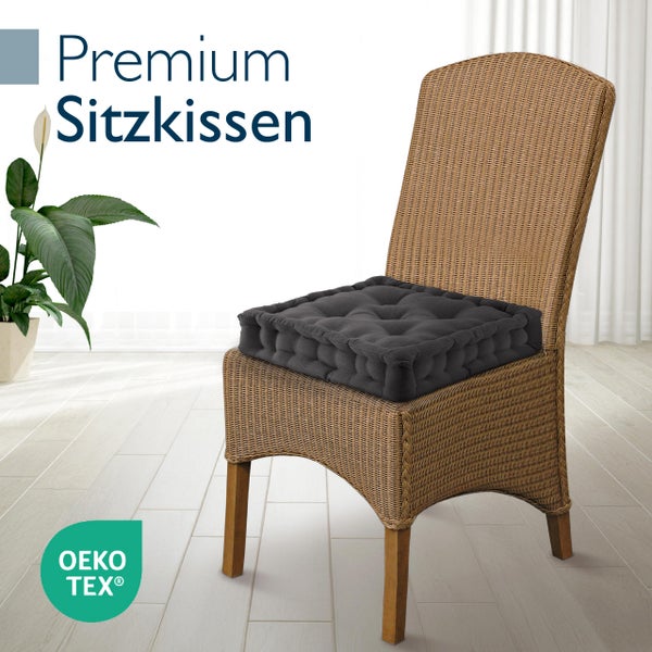 Graues Premium Sitzkissen auf einem Stuhl mit OEKO-TEX Siegel