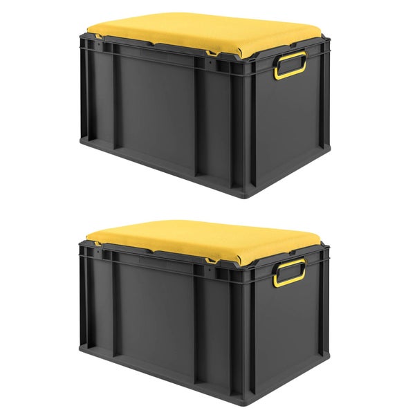 Zwei graue Aufbewahrungsboxen mit gelben Kissen