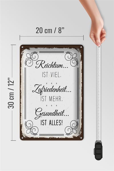 Blechschild Spruch Reichtum viel Zufriedenheit mehr 20x30cm