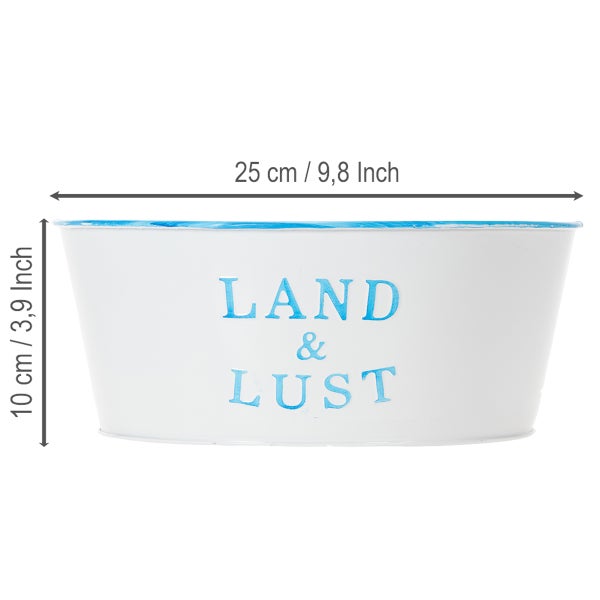 Weiße Pflanzschale aus Metall mit blauem Rand und Aufschrift Land und Lust, Breite 25 Zentimeter, Höhe 10 Zentimeter.