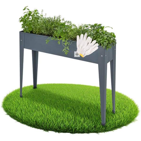 Hochbeet aus Metall mit Kräutern und Gartenhandschuhen auf Rasen