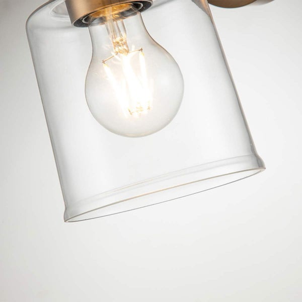 Detailaufnahme einer Lampe mit klarem Glasschirm