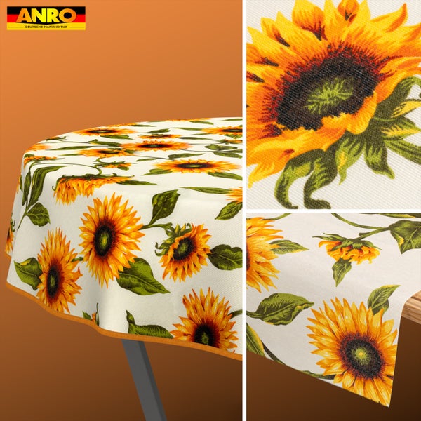 Runde Tischdecke mit Sonnenblumen und ANRO Logo. Detailansicht der Oberfläche und des Musters.