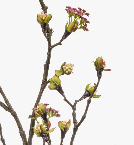 Künstlicher Zweig mit gelben Knospen und grünen Akzenten an einem braunen Stiel.