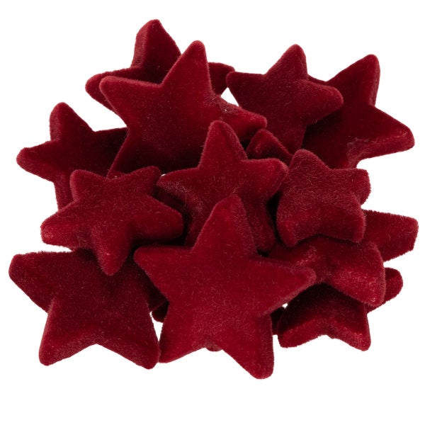 Dekosterne aus rotem Samt für die Weihnachtsdekoration.