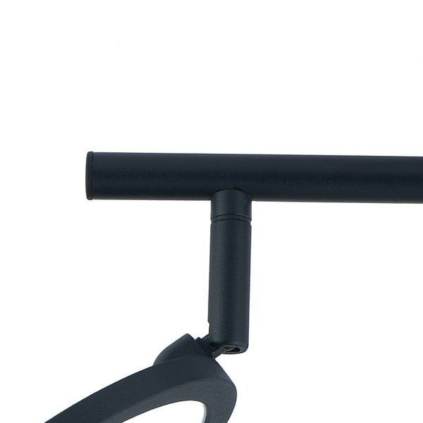 Detailansicht eines schwarzen Metall-Schienensystems mit zylindrischer Stange und Gelenk.