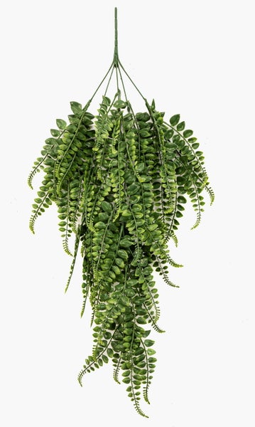 Detailaufnahme eines künstlichen Monstera-Blattes mit typischen Blatteinschnitten und Blattadern.