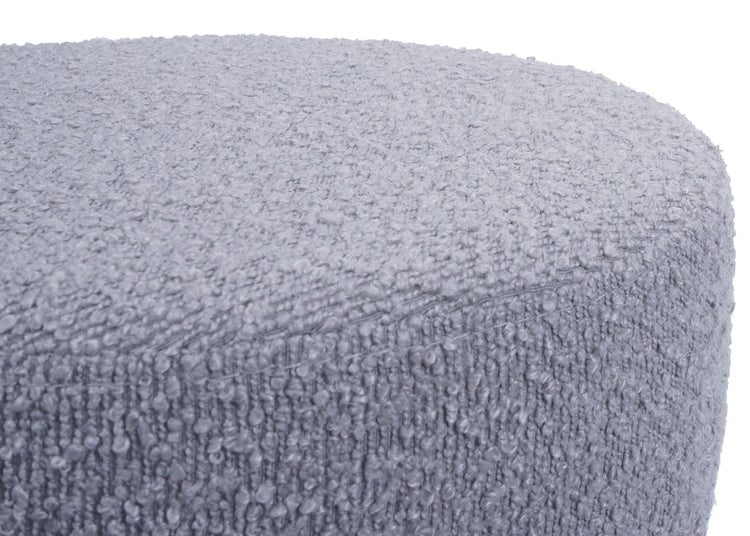 Detailansicht eines Poufs mit Stoffbezug