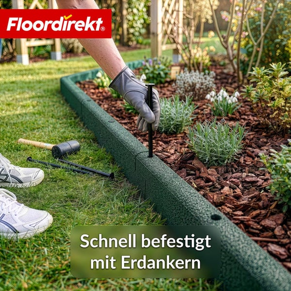 Installation einer grünen Rasenkante mit Erdankern im Garten