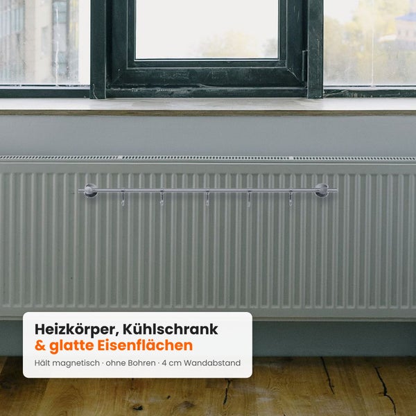Magnetische Hakenleiste für Heizkörper zur Montage ohne Bohren mit fünf Haken und vier Zentimeter Wandabstand.