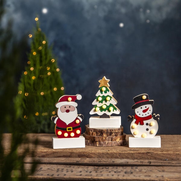 Dekorative Solarleuchte in Blütenform mit LED Beleuchtung hängt an einem Ast