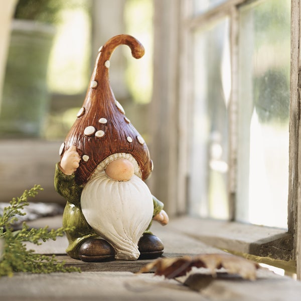 Dekorativer Gartenzwerg mit Mütze und Bart