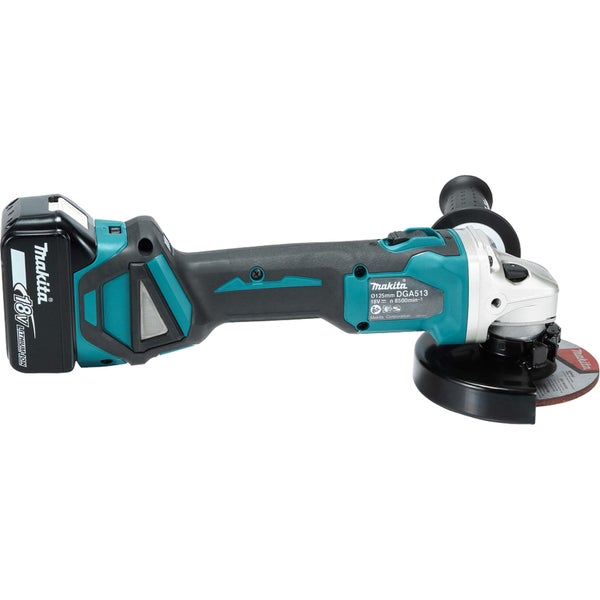 Makita Akku-Winkelschleifer 18 Volt für Scheiben mit 125 Millimeter Durchmesser, mit Akku und Seitengriff.