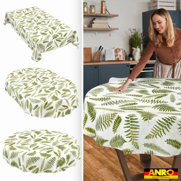 Tischdecke mit Farn-Motiv in rechteckiger, ovaler und runder Form sowie eine Frau an einem Küchentisch. ANRO Deutsche Manufaktur Logo.