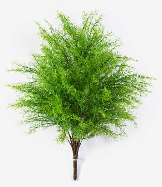 Nahaufnahme einer künstlichen Pflanze mit schmalen, spitzen Blättern aus Kunststoff.