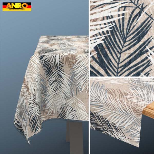 ANRO Logo. Tischdecke mit Palmenblattmuster auf einem Tisch, Detailansicht der gewebten Stoffstruktur und des Musters.